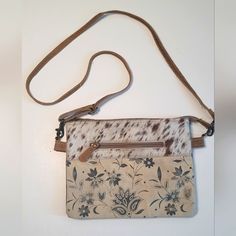 Myra S-1492 "Sanvitalia Crossbody Bag Canvas Floral Print Crossbody With Cowhide Leather On One Side. Black On The Other Side. Zippered Pockets On The Exterior Of Both Side And A Divided Center To Give You Two Sections Inside. Measures Approx: 10"X8". Looks Brand New Inside. Zip Purse, Canvas Crossbody Bag, Leather Fringe, Bag Canvas, Printed Bags, Leather Tooling, Cow Print, Black Cream, Canvas Bag