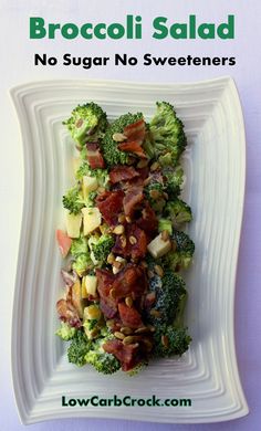 broccoli salad with bacon and pine nuts on a white plate