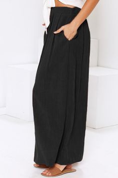 Black Buttoned Maxi Skirt Black Lined Relaxed Skirt Bottoms, Casual High Waist Black Maxi Skirt, Casual Black Lined Maxi Skirt, Full-length Black Lined Skirt, Full Length Black Lined Skirt, Solid Color Baggy Long Skirt, Wide Leg Black Maxi Skirt For Work, Casual Black Pleated Maxi Skirt, Black Pleated Casual Maxi Skirt