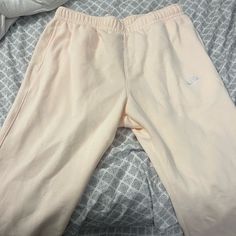 Nike Cream Sweatpants- Never Worn, Fleece Inside Nike Cotton Loungewear Bottoms, Nike Cotton Bottoms For Loungewear, Nike Relaxed Fit Trousers, Nike Sweatpants With Elastic Waistband For Spring, Nike Bottoms With Pockets For Loungewear, Nike Loungewear Bottoms With Pockets, Nike Cotton Long Pants, Nike Pants With Elastic Waistband For Loungewear, Nike Casual Pants For Spring