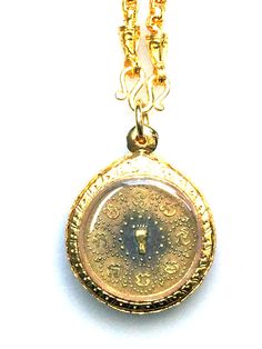 This is a perfect and unique style amulet magic pendant made of mixed magic metal amulet material with gold micron case and silver gold plated necklace, The pendant showcases an elegant design with very rare vintage style pendant. It is great to get this pendant for your loved one or treat yourself for a classic timeless style.  Amulet Size: 3 x 4 cm.,  Metal Type: silver and gold Free 1x amulet gold necklace Short Story: Buddha footprint coin Phra Phutthakosajarn (Charoen), Khao Bang Sai Temple Buddha Footprint, Gold Necklace Short, Magic Pendant, Timeless Classic Style, Gold Plated Necklace, Short Story, Silver And Gold, Very Rare, Vintage Stil