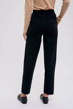 Details: These gorgeous knitted pants feel like your favorite lightweight sweater turned into a dress pant. Dressy enough for the office, but soft enough to dress down, they are both stretchy and soft, while maintaining a classy look. The tapered leg finishes the flattering look. Fit: Fits true to size. S/M (0-8), M/L (10-14) Materials & Care: 50% viscose, 28% polyester, 22% nylon. Hand wash cold, lay flat to dry. Chic Elastane Sweatpants For Loungewear, Elegant Viscose Bottoms For Workwear, Elegant High-waisted Sweatpants, Fall Workwear Sweatpants With Pull-on Style, Fall Workwear Bottoms With Ribbed Waistband, Stretch Business Casual Dress Pants With Elastic Waistband, Stretch Dress Pants With Elastic Waistband For Business Casual, Elastic Waistband Straight Leg Sweatpants For Workwear, Versatile Stretch Sweatpants For Work