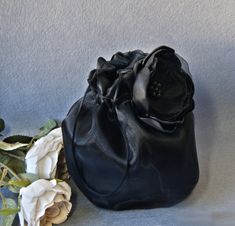 Elegant satin bag / money bag / purse ! Ideal for your wedding day, night out, party ,special occasion Color: black Decorated with gorgeous organza flower and beads- You can choose other color Fabric : satin and organza Lining : poliester Closes and opens due to elastic , very comfortable for aduls and and children. Size : approx. 18 cm x 18 cm We accept credit cards! Elegant Black Party Pouch, Elegant Evening Bag With Satin Lining For Wedding, Elegant Satin Bags For Events, Elegant Satin Finish Evening Bag, Black Evening Pouch With Dust Bag, Black Clutch Evening Bag For Gift, Black Clutch Bag For Wedding, Black Clutch Evening Bag As Gift, Formal Satin Pouch Bags