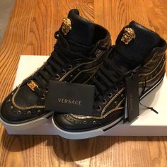 Versace First Jewel High Top Sneakers Black And Gold Size 41 / 8 Us New Never Worn In Original Box Nike Air Force 1 Versace, Nike Air Force 1 Custom Versace, Black And Gold Versace Shoes, Luxury High-top Sneakers With Perforations For Streetwear, Designer High-top Sneakers With Perforations For Streetwear, Luxury High-top Sneakers With Perforated Toe Box, Luxury High-top Sneakers With Branded Insole, Luxury Black Sneakers With Perforations, Designer High-top Sneakers With Perforations