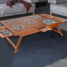 a coffee table with puzzle pieces on it