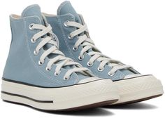 Converse.Blue Chuck 70 High Top Sneakers.High-top canvas sneakers in blue..· Rubber cap toe.· Lace-up closure.· Logo and eyelets at inner side.· Rubberized logo patch at heel.· OrthoLite™ padded footbed.· Treaded rubber sole.· Contrast stitching in white.Supplier color: Cocoon blue.Upper: textile. Sole: rubber..Made in Viet Nam..232799M236073