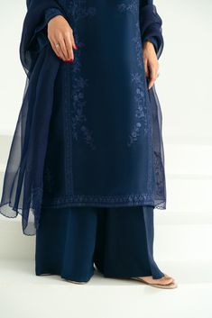 Evara Blue Silk Palazzo Set With Sheer Dupatta, Embroidered Silk Blue Palazzo Set, Elegant Semi-formal Sets For Eid, Blue Cotton Silk Salwar Kameez With Sheer Dupatta, Indigo Chanderi Traditional Wear For Wedding, Elegant Georgette Palazzo Set With Embroidered Border, Traditional Indigo Sets With Dupatta, Blue Embroidered Palazzo Set For Designer Outfits, Blue Silk Sets For Diwali