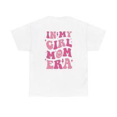 Embrace the #girlmomlife with this fun and comfy graphic tee. Featuring a bold "In My Girl Mom Era" design, this shirt is a perfect way to celebrate raising your daughters. Made from 100% soft cotton, this t-shirt is breathable and relaxed, ideal for busy moms on the go. Whether you're running errands, cheering on your girls at a recital, or just relaxing at home, this tee is sure to become a staple in your wardrobe. Pink Graphic Print T-shirt For Mother's Day, Pink T-shirt With Letter Print For Everyday, Family Matching T-shirt With Graphic Print For Mother's Day, Family Matching Graphic Print T-shirt For Mother's Day, Pink T-shirt With Funny Print For Everyday Wear, Family Matching Slogan Cotton T-shirt, Family Matching Cotton Slogan T-shirt, Mother's Day Pink Graphic Tee, Mother's Day Slogan Graphic Tee