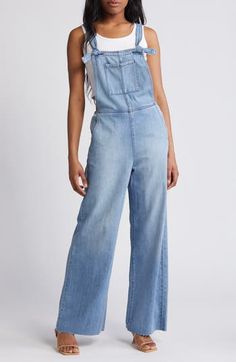 Raw hems give lived-in appeal to these laid-back overalls cut with a relaxed, straight-leg fit. 29" inseam Square neck Adjustable buckle straps 73% cotton, 27% rayon Machine wash, tumble dry Imported Casual Straight Leg Spring Overalls, Casual Straight Leg Light Wash Overalls, Light Wash Relaxed Fit Overalls For Work, Relaxed Fit Light Wash Overalls For Workwear, Spring Light Wash Straight Leg Overalls, Casual Light Wash Overalls For Workwear, Spring Utility Jeans With Bib Front, Casual Bib Front Denim Blue Jeans, Fall Light Wash Straight Leg Denim Jumpsuit