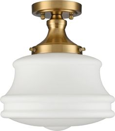 a light fixture with a white glass shade on the bottom and gold trimmings