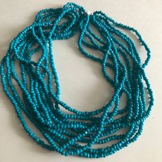 Multi Strand Dyed turquoise Bone beaded Ethnic Necklace Long 36" All jewelry has been worn and may show signs of wear.  Please see photos as all sales are final. Offers to lower the prices on all my items are welcomed. I do combine shipping so please wait for an invoice if buying more than one item. Fill up a small flat rate priority box or a padded bag for one shipping price of $10.60 USA only! Spend $35.00 and shipping is FREE!  No shipping outside USA.  Display box in photos not included. Tha Traditional Turquoise Wooden Beads, Traditional Turquoise Beaded Necklaces With Wooden Beads, Bohemian Turquoise Beaded Necklaces With Wooden Beads, Traditional Turquoise Beaded Necklace With Wooden Beads, Turquoise Multi-strand Beaded Necklace For Festivals, Long Turquoise Beaded Necklace For Festivals, Turquoise Beaded Long Necklace For Festivals, Traditional Turquoise Necklace With Wooden Beads, Turquoise Beaded Necklace For The Beach