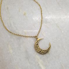 18K Gold Calligraphic Written on Moon Islamic Necklace, Engraving Moon Necklace, Arabic Necklace, Moon Necklace Gold, Minimal Moon Jewelry Details:- Length: 17 inches + Extender  Material: 18k gold plated, Brass Care:- When not wearing, please keep in a sealed plastic bag Packaging: All our pieces comes in a gift box bag so your item is ready to be gifted If you have any question feel free to contact us via Etsy message Happy Shopping Engraved Moon-shaped Brass Necklace, Engraved Moon Shaped Brass Necklace, Engraved Brass Moon Necklace, Moon Shaped Necklace With Moon Print For Gift, Moon Print Necklace Perfect For Gifts, Moon Print Moon Shaped Necklace For Gift, Moon Print Moon-shaped Necklace Gift, Moon Print Moon Shaped Necklace Gift, Crescent Moon Print Jewelry As A Gift