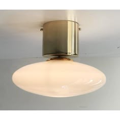 an image of a ceiling light that is in the middle of it's lighting fixture