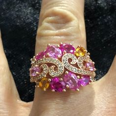 18k Rose Gold Plated Sterling Silver Pink Sapphire Ring With Light Pink And Darker Pink Lab-Created Sapphires And Lab-Created White Sapphires And Lab-Created Citrine Accents. In Wonderful Estate Condition Without Any Noticeable Wear. Marked .925 Absolutely Gorgeous Ring! See Our Photos For Details. Offers Welcome! Elegant Pink Multi-stone Rings, Pink Diamond Multi-stone Jewelry, Rose Gold Multi-stone Cubic Zirconia Ring, Rose Gold Multi-stone Pink Sapphire Jewelry, Rose Gold Multi-stone Jewelry With Pink Sapphire, Luxury Pink Rings With Hallmark, Luxury Pink Rings Hallmarked, Luxury Pink Hallmarked Rings, Fine Jewelry Pink Multi-stone Jewelry