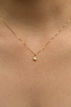 Solid 14k gold settings and dainty box chain. Ethically sourced, genuine 3mm Australian opal. Every stone is unique, varying in shades from blue green to pinky purple. Total width of pendant is approx. 6mm. Hand-formed and cast with recycled yellow gold, giving each one its own unique look and feel. This dainty design comes on a .5mm solid 14k gold box chain. Made with longevity in mind, this piece of fine jewelry will be with you for years to come. Ethically made in Los Angeles. This design is Simple Stone Jewelry, Dainty Gold Chain With Pendant, Fine Chain Necklace, Simplistic Gold Jewelry, Dainty Gold Pendant, Basic Gold Necklace, Gold Simple Jewelry, Gold Fine Necklace, Simple Gold Necklace Designs