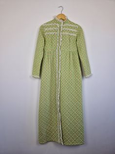 This item is from our Outlet section therefore it might be of a lower quality than our standard vintage selection. It might have some visible flaws or require some alterations or repairs. Please read description and check photos carefully. Vintage 60s / 70s Cherri Lynn dressing gown. Buttoned down. Lace detailing. Pockets. Good vintage condition / some tearing on the lining, some loose stitching, light discolouration around armpits Please check measurements on the photos. Visit our Instagram @el Vintage Long Sleeve Robe For Fall, Spring Vintage Robe For Loungewear, Vintage Long Sleeve Robe For Spring, 60s Loungewear, Fitted Vintage Robe For Daywear, Long Vintage Robe For Daywear, Vintage Long Robe For Daywear, 1960s Lounge Wear, 1950s Dressing Gown