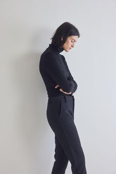 Made from premium ribbed fabric, this turtleneck sweater offers a luxurious feel against the skin. The ribbed texture adds depth to its design while providing a flattering and form-fitting silhouette that accentuates your curves in all the right places Black Ribbed Turtleneck, Fitted Black Turtleneck With Thumbholes, Black Ribbed Fitted Turtleneck, Black Ribbed Collar Turtleneck Top, Black Stretch Turtleneck With Ribbed Collar, Semi Annual Sale, Ribbed Turtleneck, Fashion Help, Ribbed Fabric