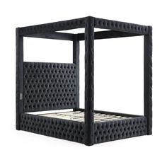 the bed frame is made out of black plastic and has an intricate pattern on it