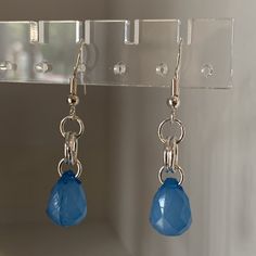 Handmade Blue Bead Earrings. Double Ring On Bead For An Added Touch Of Style. Beads Are Plastic. All New Hypoallergenic Nickel Free Hardware. Cute Everyday With Blue Jeans Or Great Beachy Earrings! Blue Teardrop Crystal Earrings With Ear Wire, Blue Dangle Crystal Earrings With Dangling Beads, Blue Crystal Earrings With Dangling Beads For Gift, Blue Crystal Dangling Earrings, Blue Dangling Beads Teardrop Earrings, Blue Dangle Teardrop Earrings For Pierced Ears, Blue Crystal Earrings With Dangling Beads, Handmade Blue Teardrop Crystal Earrings, Nickel Free Blue Teardrop Beaded Earrings