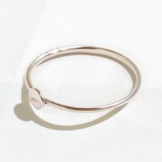 This stacking ring rocks a subtle statement disc that catches the light *just* right.DETAILS- 14k Gold Filled or Sterling Silver- Nickel-free and naturally hypoallergenic- Sizes 5-8- Need help with your ring size? We got you. Simple Tiny Round Stackable Rings, Tiny Simple Round Stackable Rings, Simple Tiny Stackable Round Rings, Minimalist Stackable Round Midi Rings, Delicate Adjustable Stackable Rings, Simple White Gold Midi Rings, Hypoallergenic Promise Stackable Round Rings, Hypoallergenic Promise Stackable Rings, Minimalist Nickel Free Round Band Ring