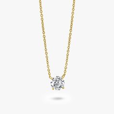 Add a touch of elegance to any outfit with this stunning Round Brilliant Solitaire Necklace. This necklace features a single, expertly cut lab-grown diamond in a round brilliant shape, providing maximum sparkle and brilliance. The diamond is set in a classic and timeless design that will never go out of style. The pendant comes with an adjustable chain that can be worn at lengths of 16-18 inches, making it versatile and perfect for layering with other necklaces. This Round Brilliant Solitaire Necklace is the perfect addition to any jewelry collection and is sure to become a favorite. Clarity: VS or better Color: Near Colorless (FG) Cut: Round Brilliant Chain Length: 16-18 in Additionally, all the diamonds over 1 Ct will come with certification, providing you with peace of mind and assuranc Elegant Necklace With Prong Setting And Lab Grown Diamonds, Dazzling Solitaire Necklace With Single Cut Diamonds, Elegant Necklace With Diamond Cut Lab Grown Diamonds, Formal Solitaire Diamond Cut Necklace, Elegant Lab Grown Diamond Necklace With Brilliant Cut, Elegant Brilliant Cut Lab Grown Diamond Necklace, Classic Vvs Clarity Diamond Necklace, Round Solitaire Necklace With Single Diamond For Everyday Luxury, Classic Yellow Gold Solitaire Necklace With Single Cut Diamonds