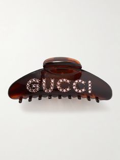 This hair clip is sure to be your most-envied accessory. It's been made in Italy from glossy resin punctuated with crystals to spell out Gucci. Day or night, it'll be the perfect addition to your outfit. Gucci Hair Clip, Luxury Pierced Gucci Jewelry, Elegant Pierced Gucci Jewelry, Luxury Pierced Gucci Earrings, Gucci Headband, Gucci Accessories, Fashion Hair Accessories, Hair Claw, Hair Accessories For Women