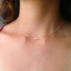 "\"Safra\" ♀️ 925 sterling silver dainty chain necklace with three tiny pearls ♀️ Pearl: Purity,innocence, generosity ♀️ Birthstone month: June ♀️ Length: 16 in. and 18 in. (Model is wearing 16 in. necklace) ♀️ Nickel free ♀️ Made in the USA Safra Catz is the highest paid woman CEO with a $40 million salary." Dainty Sterling Silver Charm Necklace With Pearl Chain, Dainty Silver Charm Necklace With Pearl Chain, Delicate Sterling Silver Charm Necklace With Pearl Pendant, Delicate Sterling Silver Pearl Necklace With Delicate Chain, Dainty Birthstone Necklace With Adjustable Chain, Delicate Silver Necklace With Tiny Beads, Dainty Sterling Silver Pearl Necklace In Silver, Delicate Sterling Silver Birthstone Necklace With Adjustable Chain, Dainty Silver Sterling Silver Pearl Necklace