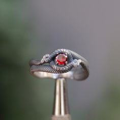 Ruby Stone Snake 925 Silver Ring, Health Symbol Snake, Self-Eating Snake Symbol 925 Sterling Silver, Emerald Snake Oxidized Silver Ring Let's not forget that it is handmade. There may be minor differences. I can work the same ring with other natural Gemstones.  Please contact us to learn about our Gem stone stocks. If you have any questions, please feel free to contact me, we are happy to help. Your jewelry will be packed in a luxury jewelry box ready to be given as a special gift. Visit my shop Unique Silver Ruby Birthstone Ring, Unique Silver Ruby Ring With Birthstone, Red Symbolic Sterling Silver Ring, Unique Sterling Silver Snake Ring As Gift, Handmade Sterling Silver Snake Ring For Wedding, Silver Sterling Silver Ruby Ring Gift, Sterling Silver Ruby Ring As Gift, Anniversary Gemstone Snake Ring, Anniversary Snake Ring With Gemstone