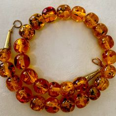 From My Family Heirloom. Vintage But In Great Condition, No Flaws. 21.5” Length. Beautiful Rich Color. The Beads Are Well Made, Spectacular And Would Last For Another Generation. Artisan Single Strand Orange Beaded Necklace, Orange Oval Beaded Necklaces As Gifts, Orange Oval Beaded Necklace For Gifting, Orange Oval Beaded Necklace For Gift, Orange Single Strand Beaded Necklace With Round Beads, Orange Single Strand Beaded Necklace, Orange Large Beads For Jewelry Making, Large Orange Beads For Jewelry Making, Orange Round Spacer Beads