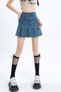 Revisit the cool trends of the late '90s and early '00s with our Y2k Pleated Jean Mini Skort. Combining the best of both worlds, it looks like a skirt but offers the comfort of shorts underneath. Featuring a belt looped waist and twin front pockets, it's a must-have for those nostalgic about Y2K style. Y2k aesthetic Skater skirt Zip & button fastening Dark wash denim material Belt looped waist Cotton, polyester Twin front pockets Skirt with under shorts Korean Y2k Fashion, Dark Academia Dresses, Aesthetic Skater, Boring Outfits, Korean Y2k, Pleated Denim Skirt, Jeans Patchwork, Aesthetic Clothing Stores, Under Shorts