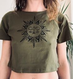 Our Lino blocks have made it onto clothing, and I'm super excited to share our crop tee. Available in lots of different colours and sizes, all Handprinted by me. Size XXS 6 XS 8 S 10 M 12 L 14 XL 16 I aim to ship within 14 working days, if for any reason there is a delay you will be contacted at the first opportunity. Any questions about variations or personalisation please feel free to message, I will be happy to help. Spring Festival Hippie T-shirt, Green Bohemian T-shirt For Summer, Summer Beach Crew Neck Crop Top, Summer Beach Crop Top With Crew Neck, Summer Crew Neck Crop Top For The Beach, Hippie Short Sleeve T-shirt For Music Festival, Hippie Cotton T-shirt For Summer, Summer Festival Graphic Print T-shirt, Graphic Print Festival T-shirt For Summer