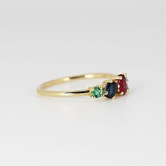 This beautiful cluster ring was made of 14k gold band, 14k gold prong settings. It's perfect as engagement ring or statement piece. DETAILS ABOUT THE RING, MATERIAL AND STONES * 14k 1.2 mm solid gold band and prongs. * 5x3.5 mm oval shape ruby * 4x3 mm oval sapphire * 4x3mm 0val emerald * 2.5mm round emerald * Birthstones : September, May, July We can make this design with any of gemstones. Please contact us. This ring was hand crafted in Melt'm Jewelry Studio in California. Thanks for visiting 14k Gold Cluster Birthstone Ring, 14k Gold Cluster Sapphire Promise Ring, Yellow Gold Cluster Rings With Multi-stone, 14k Gold Multi-stone Emerald Cut Rings, Fine Jewelry 14k Gold Multi-stone Cluster Ring, 14k Gold Multi-stone Sapphire Promise Ring, Yellow Gold Multi-stone Emerald Promise Ring, 14k Gold Multi-stone Cluster Ring, 14k Gold Cluster Emerald Ring As Gift