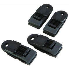 three black plastic buckles on a white background