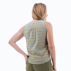 The Fair Trade Certified™ Redford Tank Top is all about summer with a cute striped design, flattering shape, incredible comfort, and a small ecological footprint. Recycled cotton and recycled polyester pair to reduce resources by repurposing fabric scraps, plastics, and other materials into this soft, comfortable tank. Guilt-free fashion! The striped pattern, which alternates in a unique and colorful three-by-two rhythm, brings brightness to the style. Flattering features include a scoop neck, s Casual Striped Tank Top For Vacation, Casual Striped Tank Top For The Beach, Vertical Stripes Tops With Relaxed Fit For Vacation, Relaxed Fit Vertical Stripes Top For Vacation, Casual Sleeveless Top With Vertical Stripes, Striped Sleeveless Summer Top, Summer Sleeveless Striped Top, Striped Sleeveless Cotton Top, Striped Cotton Tank Top For Vacation