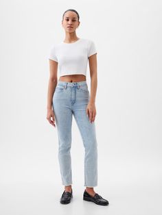 Fit: A slim, ankle-length classic.  More room than our True Skinny, but just as comfortable.  Fabric: 87% Cotton, 7% Recycled Materials, 5% Polyester, 1% Stretch.  Stretch: Stretch Jeans.  A bit of hug & a lot of hold.  Comfortable & designed to flatter.  Rise: High Rise Jeans.  Look: A classic five-pocket jean in a light indigo wash Details: Zip fly, five-pocket styling, holds-you-in front pockets, & raw hem.  Responsibly Made: This pair of jeans is part of our water-saving Washwell program.  C Fitted Slim Bottoms For Summer, Fitted Slim Summer Bottoms, Chic High Rise Gap Bottoms, Fitted Jeans For Everyday Spring Wear, Fitted Jeans For Spring Everyday Wear, Gap Tapered Leg Bottoms For Everyday, Chic Cropped Fitted Jeans, Gap High Waist Fitted Bottoms, Gap Fitted Straight Leg Bottoms