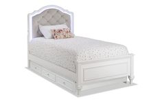 a white bed with an upholstered headboard and foot board is shown against a white background