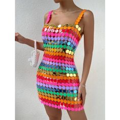 Upgrade your style with this chic and eye-catching dress that's designed to make you stand out. The notable pattern on the polyester fabric creates a cool and sexy style effect. Adorned with handmade colorful beads and an open back, this dress is a seamless and stylish choice for any occasion. Embrace the versatility and trendsetting allure of this wardrobe essential.SpecificationsBrand Name: GeraldBlack Elasticity: Non StrechSleeve Style: Spaghetti StrapFabric Type: PoplinPattern Type: PatchworkFit Type: SlimSilhouette: SheathNeckline: Slash neckDecoration: NONEStyle: Sexy & ClubDresses Length: Mid-CalfMaterial: PolyesterAge: MIDDLE AGEOrigin: Mainland ChinaCN: GuangdongSeason: All seasonClosure Type: PulloverMaterial Composition: Synthetic fiberWaistline: Natural FactorsSleeve Length(cm) Scale Dress, Glitter Party Dress, Stretch Hips, Classy Looks, Night Club Dress, Beach Mini Dress, Dopamine Dressing, Chain Dress, Shiny Dresses