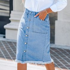 The Denim Front Button Frayed Midi Skirt is a trendy and stylish choice that combines the timeless appeal of denim with modern design elements. The front button closure and frayed detailing add a touch of edginess, while the midi length ensures a flattering and versatile fit. Whether you're aiming for a casual or dressed-up look, this skirt can be easily incorporated into various outfits, making it a versatile addition to any wardrobe. Product code: CAA02B4F006SS Casual Light Wash Button-up Denim Skirt, Non-stretch Denim Skirt With Button Closure For Spring, Chic Midi-length Cotton Denim Skirt, Mid-rise Cotton Denim Skirt With Button Closure, Spring Medium Wash Button-up Denim Skirt, Denim Midi Skirt, High Rise Denim, Bottom Clothes, Midi Length