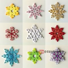 six different colored snowflakes on a white surface