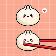 two dumplings with chopsticks sticking out of them