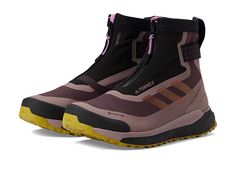 adidas Outdoor Terrex Free Hiker COOL.RDY - Women's Shoes : Shadow Maroon/Wonder Red/Pulse Lilac : Tough terrain can't stop you from hiking if you're wearing adidas Outdoor Terrex Free Hiker COOL.RDY footwear. Textile and synthetic with Primknit upper. Synthetic textile lining and insole. Gore-Tex waterproofing provides all-condition dryness. Designed to insulate your feet in cold weather stay warm with adidas COLD.RDY. Front zip closure. Round toe. Pull-tab with external heel clip. Ankle-huggin Adidas Terrex Woman, Puma Boots, Adidas Terrex Free Hiker, Tech Women, Womens Adidas, Adidas Terrex, Puma Fierce Sneaker, Cozy Outfit, Trail Running