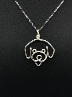 Miniature Poodle Necklace, perfect for dog moms. Pendant is handmade from a single piece of 1.3 mm tarnish free silver plated copper wire.  Chain thickness is 1.2 mm, 18 inch silver plated chain with lobster clasp.   Approximate pendant size: Width: 35 mm  Height: 40 mm  FAQs: - Minor dents may be present from the wire bending process.  Coat pliers are used to minimize dents.   - The ends of the wire pendant may appear yellow as it is silver plated copper wire.  Care instructions: To prolong the Wire Wrapped Dog Jewelry, Wire Dog, Wire Patterns, Wire Charms, Copper Wire Crafts, Wire Jewelry Patterns, Wire Wrap Jewelry Designs, Wire Wrapped Jewelry Diy, Bijoux Fil Aluminium