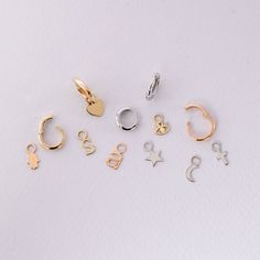 14K 18K Solid Gold Small Tiny Charms, Dainty Everyday Gold Figures For Hoop Earrings, Custom Handmade Charms, Cute Gift For Her We can add these charms to our hoop earrings model your purchased from us. Material: Solid Gold (not gold filled or gold plated) Karat: 14 K (585) 18 K (750) Available gold color: Yellow, rose and white gold M o r e * F r o m * U s Goldstore Jewelry - https://etsy.me/3gHtcrZ * Urn Necklaces - https://etsy.me/2Asb4BM * Bar Necklaces - https://etsy.me/2MhoVxO * Name Neckl Everyday Charms Huggie Earrings, Everyday Huggie Earrings With Charms, Gold Sterling Silver Huggie Earrings With Charms, Gold Huggie Earrings With Dangling Charms For Everyday, Everyday Gold Huggie Earrings With Dangling Charms, Yellow Gold Hoop Earrings With Charms, Small Hoop Huggie Earrings With Charms, Minimalist Charm Earrings For Gifts, Elegant Small Hoop Earrings With Charms