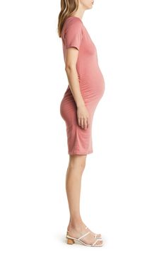 Show off your mom-to-be figure in this snap-front dress cut from a stretchy knit that moves comfortably with you and your bump. Scoop neck Short sleeves 70% viscose, 25% cotton, 5% elastane Machine wash, tumble dry Imported Maternity Stretch Dresses With Short Sleeves, Stretch Maternity Dress With Short Sleeves, Short Sleeve Maternity Stretch Dresses, Short Sleeve Stretch Maternity Dresses, Stretch Rayon Dresses, Stretch Maternity Wear Dresses Nursing Friendly, Stretch V-neck Maternity Dress, Spring Maternity Dress With Short Sleeves And Stretch, Fitted Maternity Dress With Short Sleeves