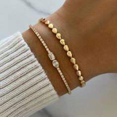 Golden Pear Bracelet MATERIALS Available in 14k Yellow Gold, 14k White Gold, and 14k Rose Gold. DETAILS Gold Weight: 5.70g Length: 6" + 1" extension Pears: 3mm x 4mm *If in stock please allow 3-5 days for delivery. If back-ordered, please allow 4-7 weeks for delivery. Rush options may be available, please contact hello@alevjewelry.com Modern Rose Gold Tennis Bracelet As A Gift, Modern Rose Gold Tennis Bracelet As Gift, Modern Rose Gold Tennis Bracelet For Gift, Rose Gold 14k Gold Stackable Tennis Bracelet, Stackable Rose Gold 14k Tennis Bracelet, 14k Rose Gold Stackable Tennis Bracelet, Elegant Adjustable Stackable Heart Bracelet, Elegant Yellow Gold Hand-set Bracelets, Tarnish-resistant Yellow Gold Bracelets For Everyday Luxury