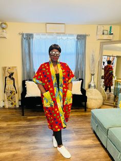 This African print duster kimono is made with the 100% cotton African wax  print.  It's a must have piece that can be styled in different ways, you can rock it over a fitted dress, skirt, shorts or pants.   Is a free size Multicolor Short Sleeve Kimono, Cotton Wrap Kaftan, Patterned Cotton Kimono With Kimono Sleeves, Oversized Cotton Kimono With Kimono Sleeves, Multicolor Cotton Outerwear With Kimono Sleeves, Oversized Cotton Kimono With Open Front, Red Long One Size Kimono, Red Long One-size Kimono, Red One Size Long Kimono