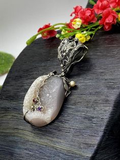 "UNIQUE DRUZY PENDANT Hand-made Sterling Silver , 24 k Gold. Stones used: Druzy, Pearls, Garnet, Amethyst. Height - 78mm, Width - 30mm Unique Handcrafted One-of a-kind Design Pendant Each Piece of Jewelry in my Collection is Absolutely One of a Kind! When you start wearing a piece of my jewelry you will fall in love with it more and more each day and feel that good Energy and Love that I pass into it while creating this piece of Art. A piece of Art created for you to be inspired and love it thro Exquisite Pendant Necklace For Gift, Exquisite Pendant Necklaces, Luxury Pendant Necklace With Stone Setting, Luxury Necklaces With Stone Setting For Gift, Luxury Necklace With Stone Setting For Gift, Luxury Gift Necklace With Stone Setting, Luxury Handmade Oval Pendant Necklaces, Exquisite Handmade Pendant Necklace, Exquisite Handmade Pendant Jewelry