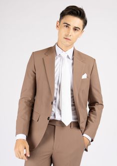 Experience the sophistication and comfort of the Astor Light Brown Stretch Suit, crafted from premium stretch cotton and designed with a timeless classic style. Its light brown hue is versatile for many occasions, so you can look effortlessly elegant without compromising on comfort. Elegant Cotton Wedding Suit, Elegant Wedding Cotton Suits, Tailored Neutral Suits For Formal Occasions, Classic Neutral Suit With Notch Lapel, Tailored Suits In Neutral Color For Business, Brown Slim Fit Suit For Office, Beige Slim Fit Blazer For Business, Slim Fit Beige Blazer For Business, Elegant Neutral Suits For Formal Occasions