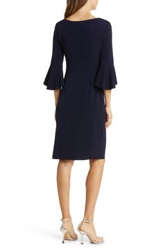 Step into the social season with confidence in this faux-wrap dress made from soft, stretchy jersey with side ruching and abbreviated sleeves. 40" length (size 8) Slips on over head Ballet neck Three-quarter sleeves Unlined 96% polyester, 4% spandex Machine wash, tumble dry Imported Stretch V-neck Dress With Surplice Neckline For Party, Stretch Dress With 3/4 Sleeves For Fall, V-neck Dress With Gathered Sleeves For Fall, Fitted Wrap Dress With 3/4 Sleeves, Cocktail V-neck Mini Dress With Gathered Sleeves, Fall Wedding Guest, Fall Wedding Guest Dress, Faux Wrap Dress, Three Quarter Sleeves