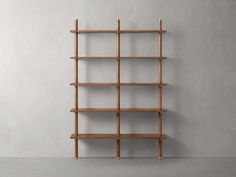 a wooden shelf with several shelves on it